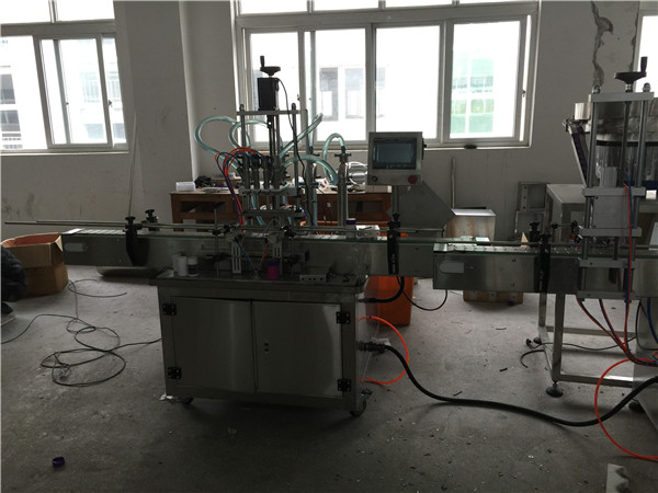 Aŭtomata piŝta likva pleniga maŝino 50ml ĝis 1L