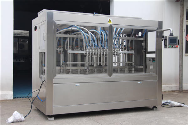 Plene aŭtomata mielo pleniganta maŝinon en boteloj 